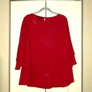 Red bell sleeve shirt